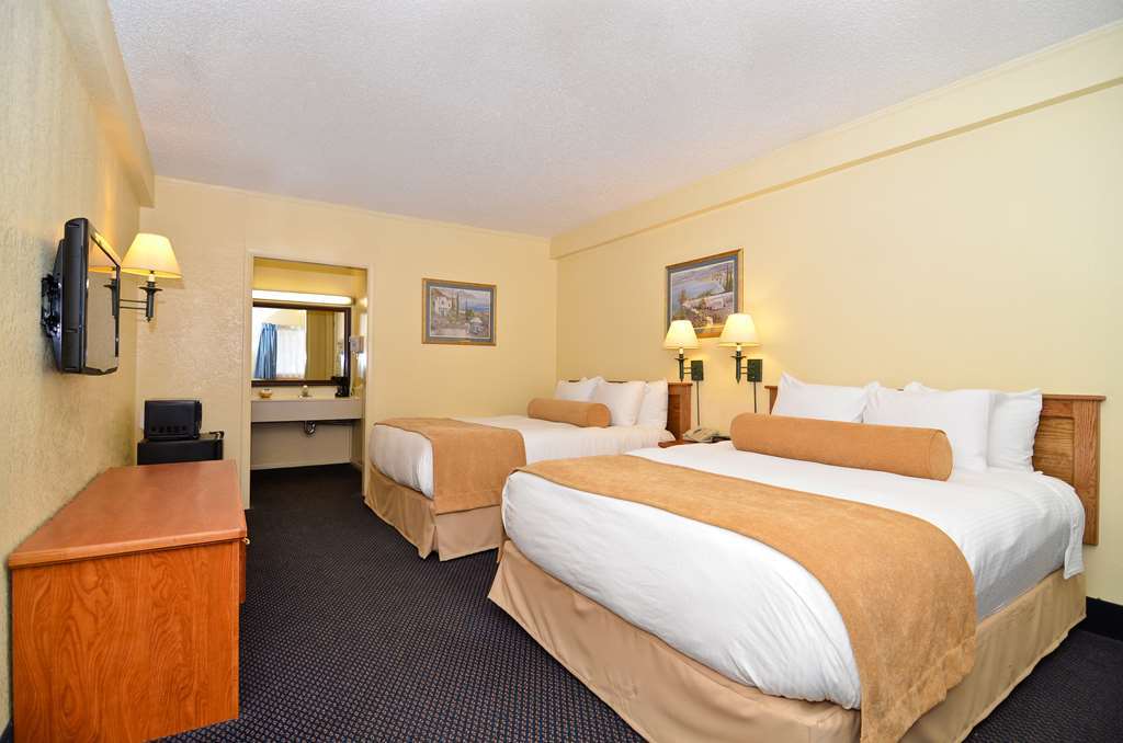 Asam Hotel Goodland Szoba fotó